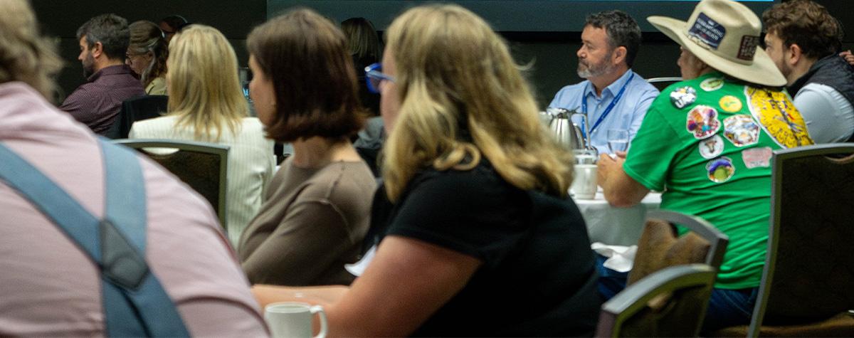 Luncheon attendees listen to a keynote speaker at an Anchorage Chamber of Commerce event.