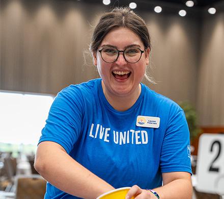 Lauren Petersen, our Communications & Engagement Coordinator, helping with Community Campaign Kickoff 2025.