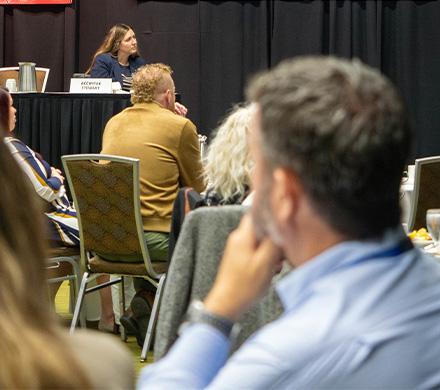 Luncheon attendees listen to a keynote speaker at an Anchorage Chamber of Commerce event.