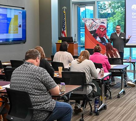 Eric Billingsley, United Way's President and CEO, presents at an ECC training.