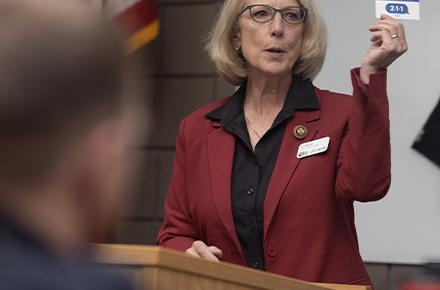 Sue Brogan, United Way's COO & Alaska 211 Director, presents information about Alaska 211.