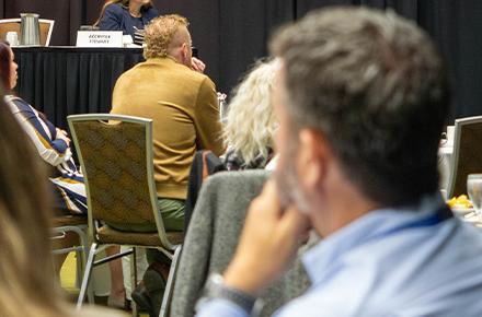 Luncheon attendees listen to a keynote speaker at an Anchorage Chamber of Commerce event.