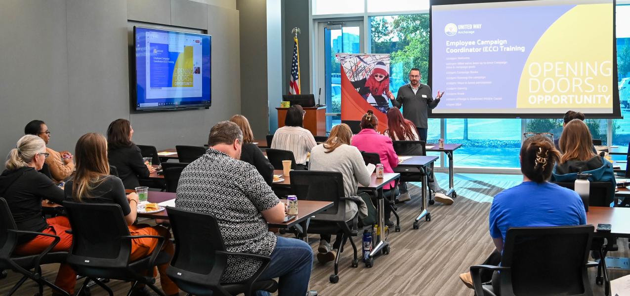 Eric Billingsley presenting to employee campaign coordinators (ECCs) at an ECC training for the 2025 Community Campaign
