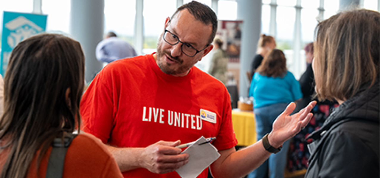 Our President and CEO talks to people at our 2025 Community Campaign Kickoff.