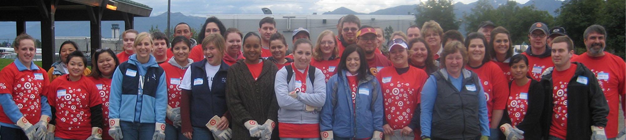 Target employees in Anchorage gather for a photo before a day of volunteering.