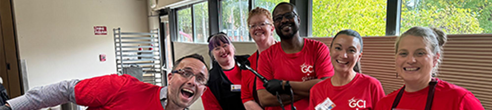 Volunteers from GCI help serve lunch at the Senior Center in Anchorage on our 2026 Day of Caring.