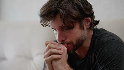Man feeling overwhelmed 
