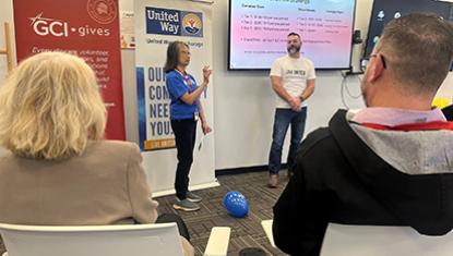 GCI employees gather to hear speaker at their United Way campaign kickoff