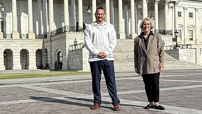 Eric Billingsley and Sue Brogan stand outside the U.S. Capital in May 2026.