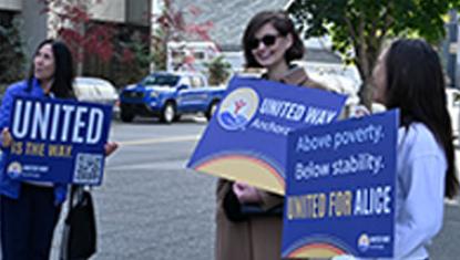 United Way of Anchorage employees participate in a positive picket for the launch of our 2026 ALICE in Alaska report.
